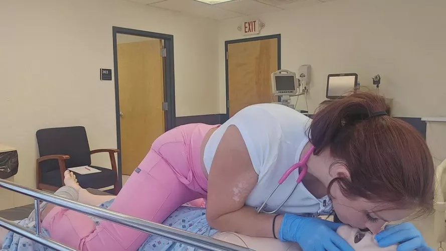 Naughty nurse at work. delivering dirty fun with precision.