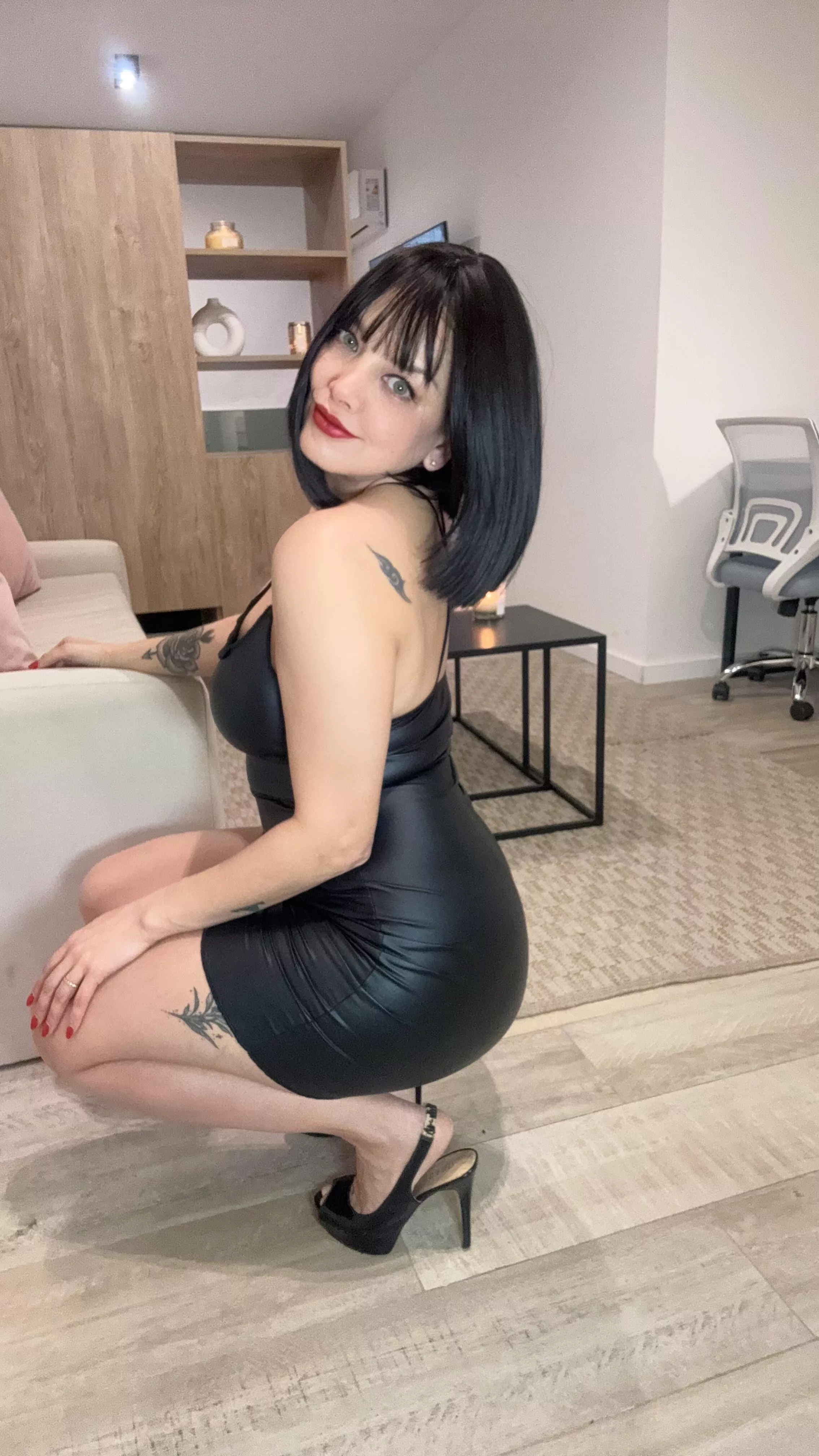 Leather dress and heels… would you take on a date wearing this outfit?