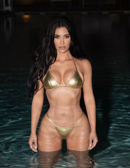 Kim in gold bikini 😎