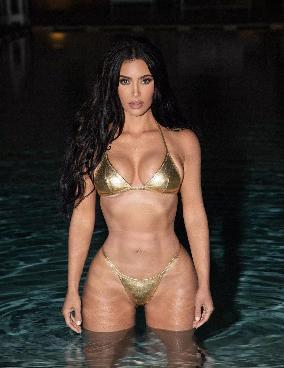 Kim in gold bikini 😎