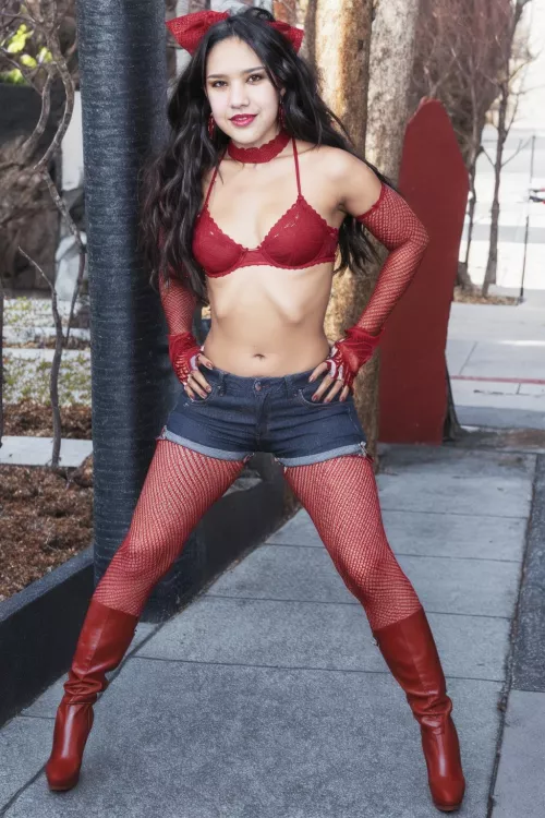 Boots and fishnets are a winning combo