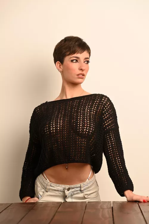 Stunning open knit dress, shame it's practically irresistible... almost as tempting as the person wearing it. haha