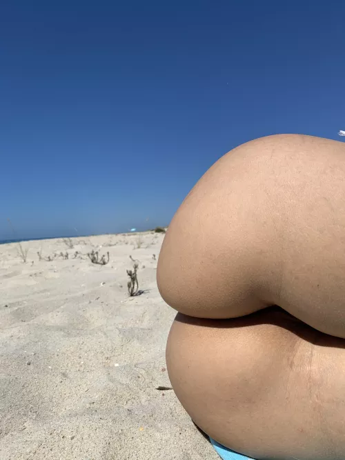 Showing off my dimples on the beach
