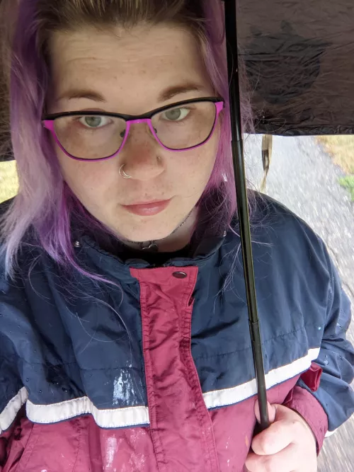 Hot girl walks in the rain