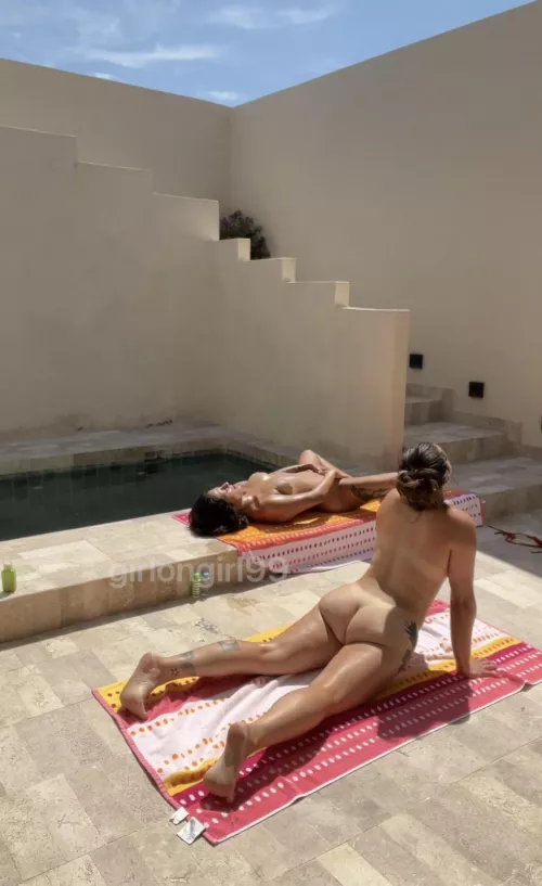 Stretching and yoga by the community pool