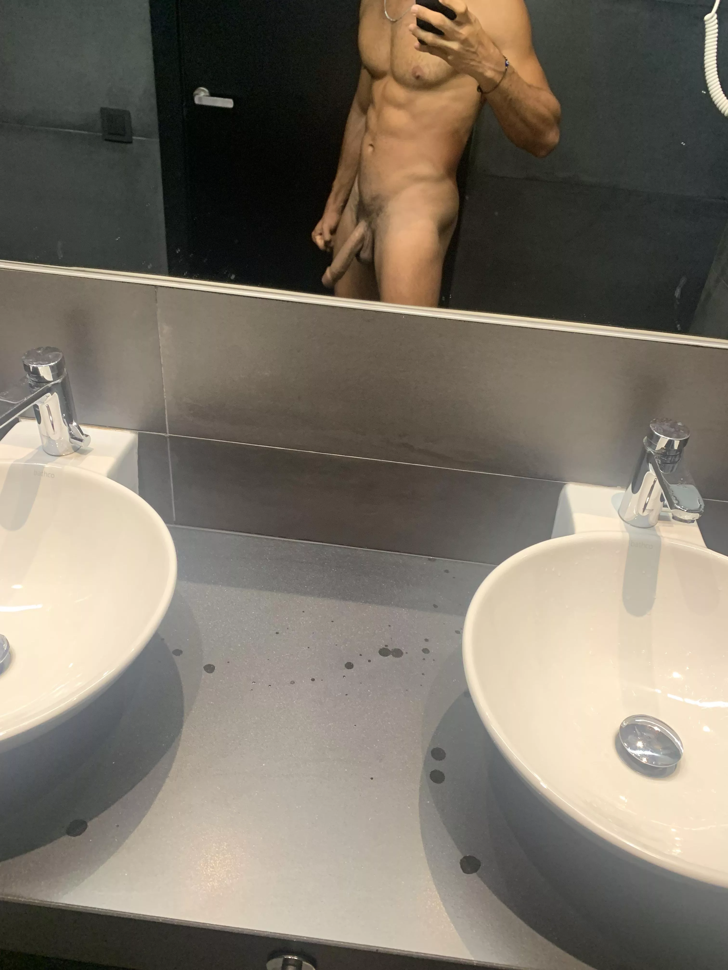 That door was unlock and it was a hostel. Anyone could open at anytime.  I got hard because of that 