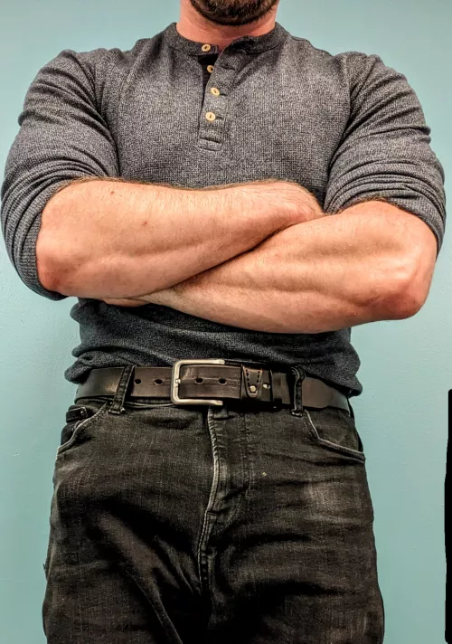 Henley's are perfect for showing off bulging forearms, and skinny jeans are perfect for...well...