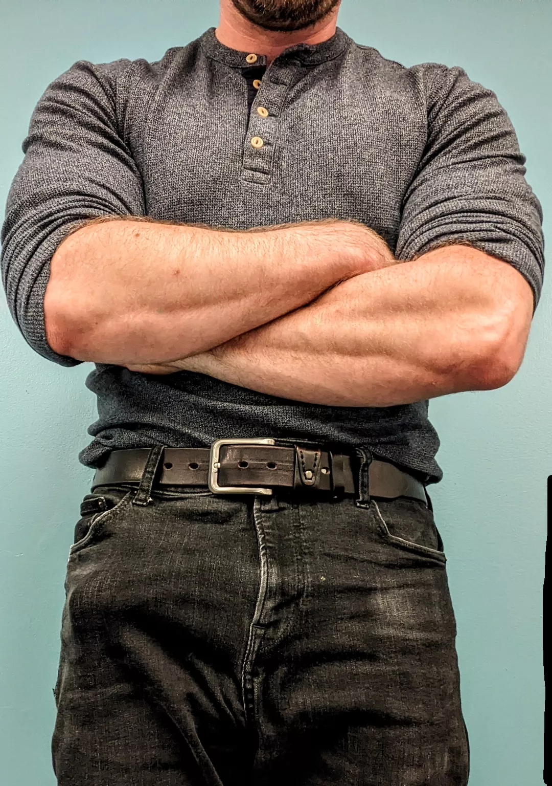 Henley's are perfect for showing off bulging forearms, and skinny jeans are perfect for...well...