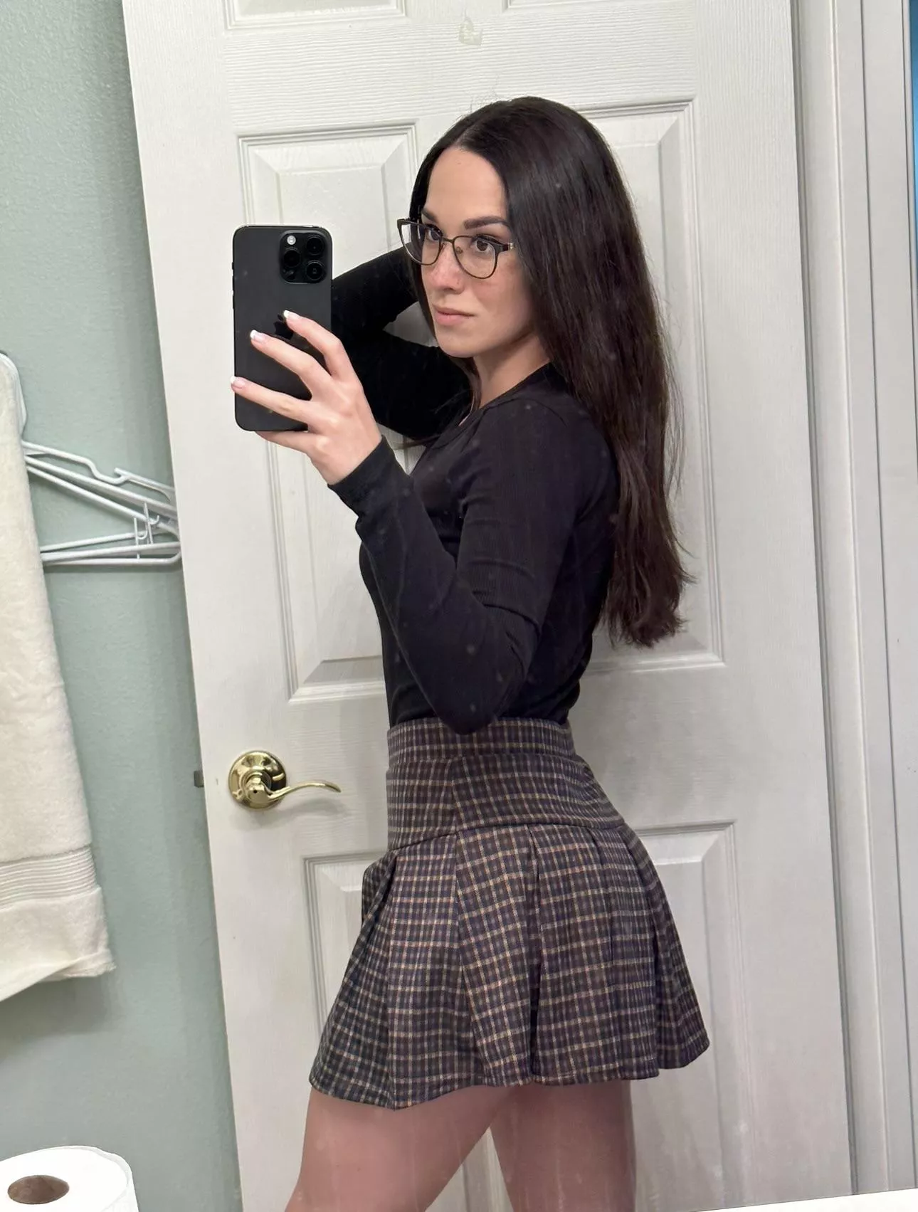 Skirts and glasses pair together well. 