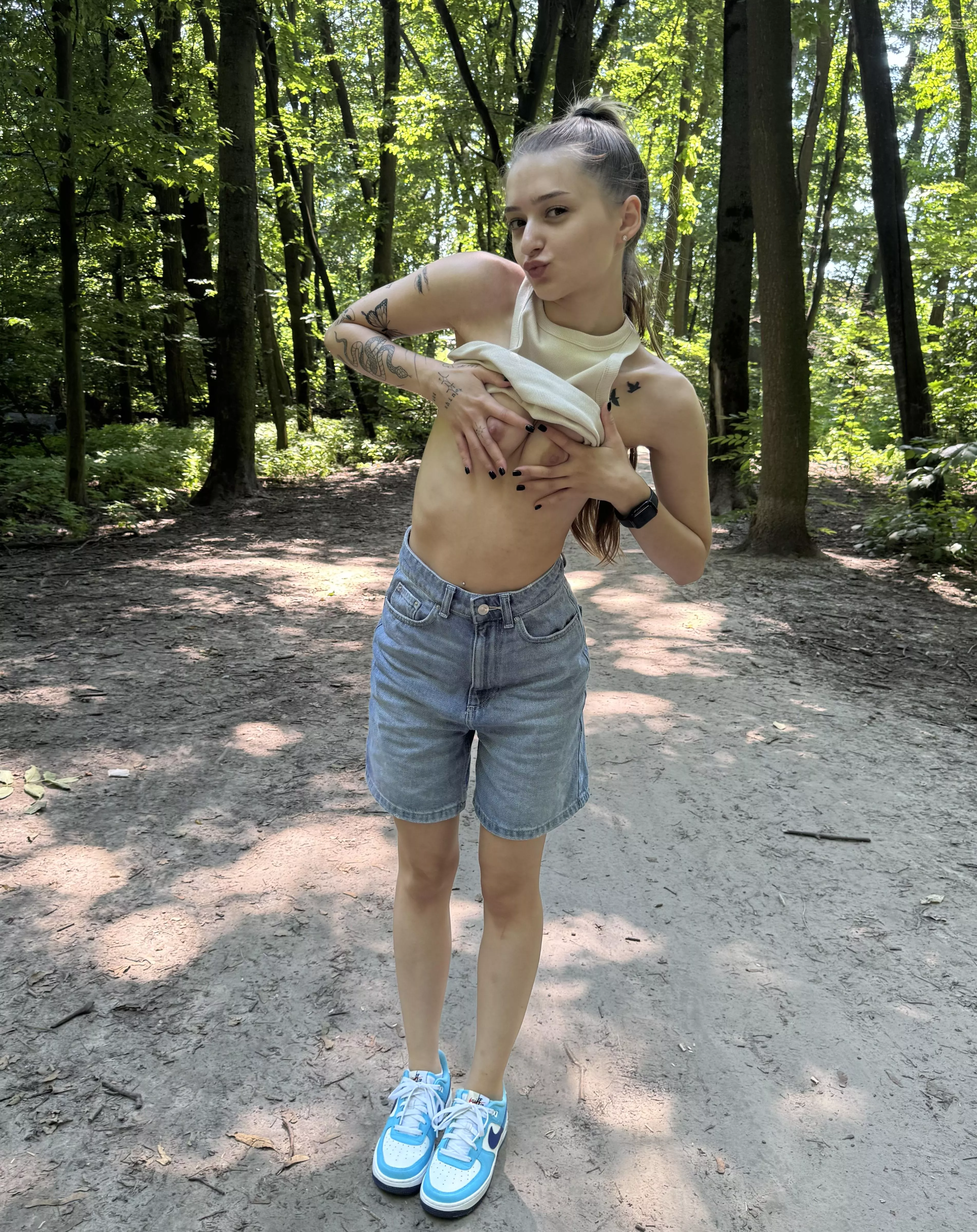 Small tits outdoors taking a walk
