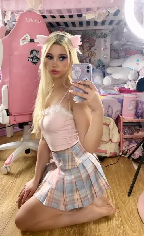 Describe this little kitty in one word