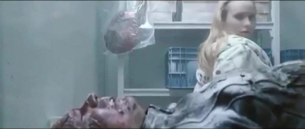 Do anybody know the name of this movie or the actress atleast ?they was in a cold storage room the guy was dead and the blonde girl gets up and start stomping the guys balls 
