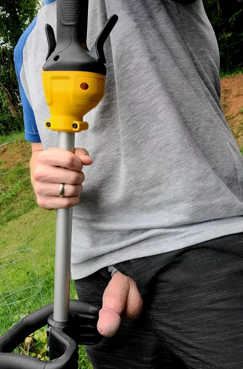 Daddy likes to keep his bushes trimmed.