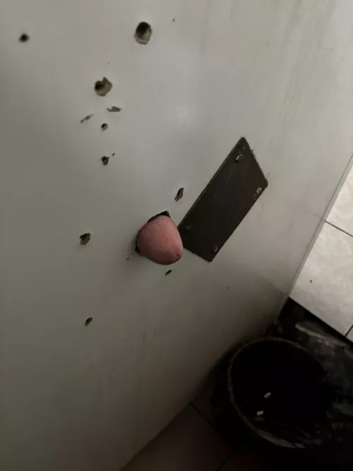 Poking through public gloryhole