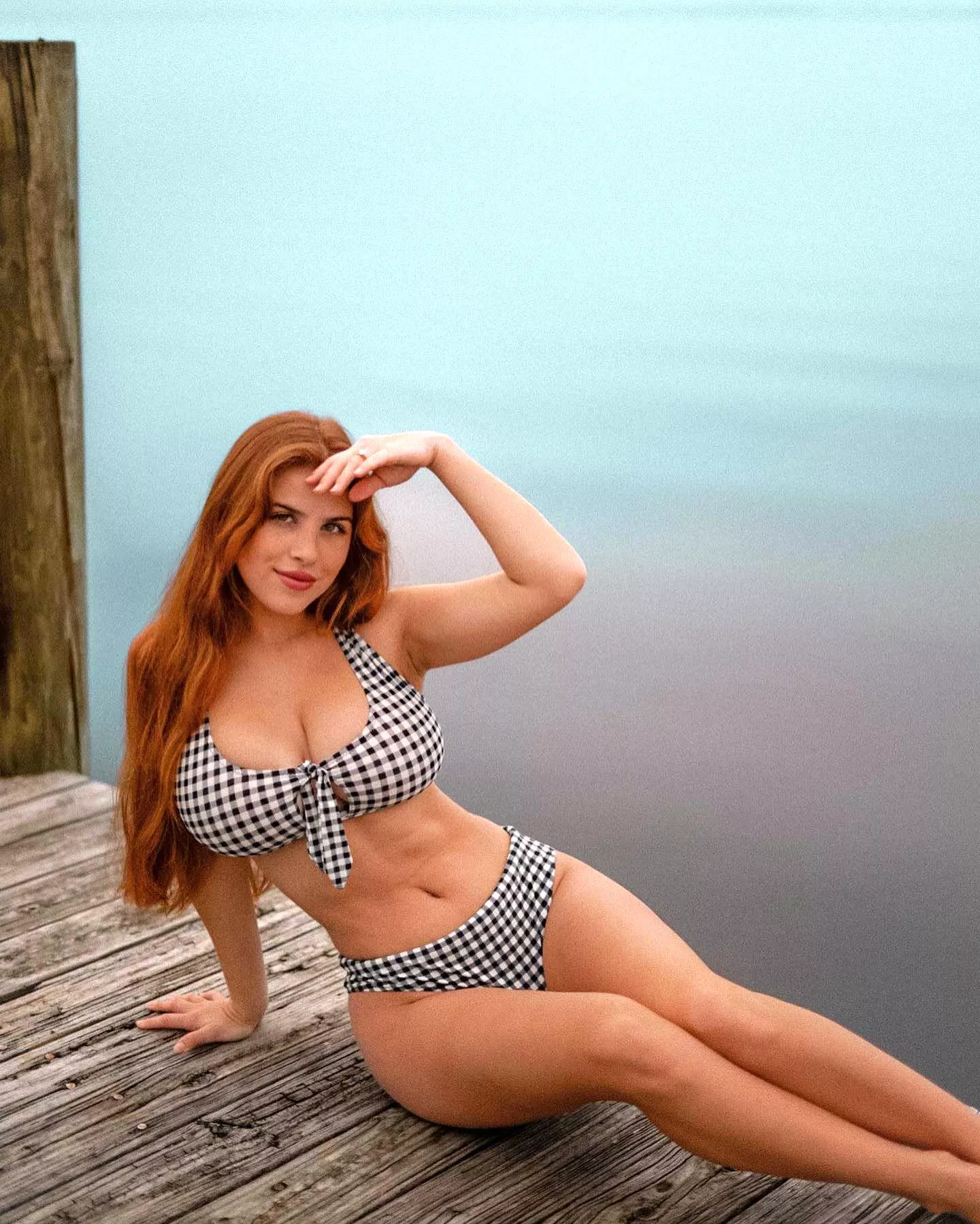 redhead in a classic gingham bikini