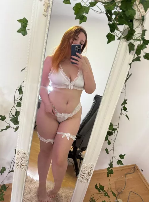 White lingerie with nude legs
