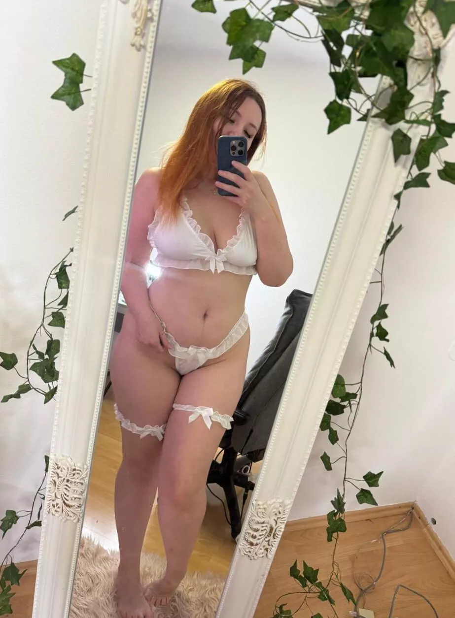 White lingerie with nude legs