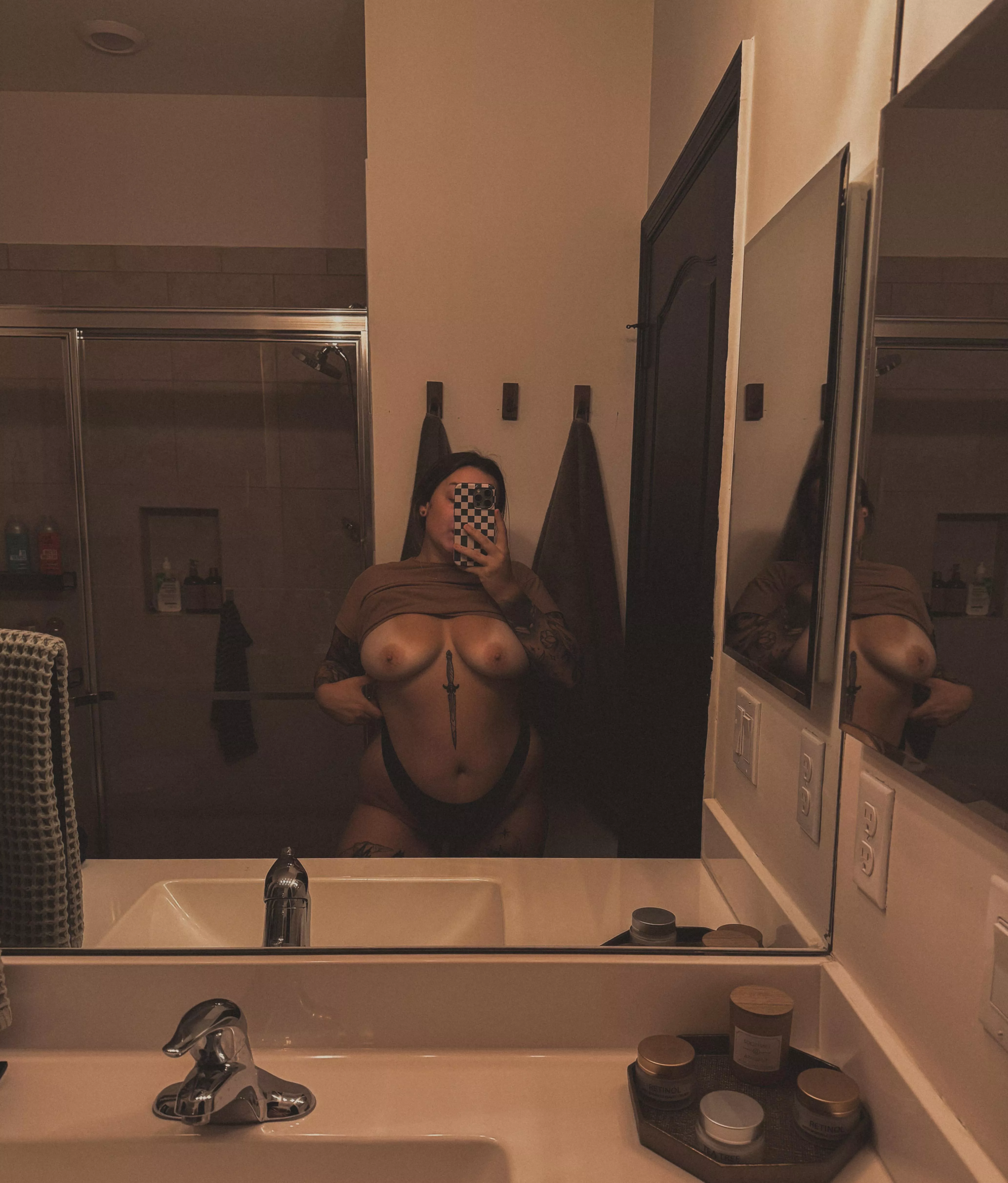 Bend over or sitting on the counter