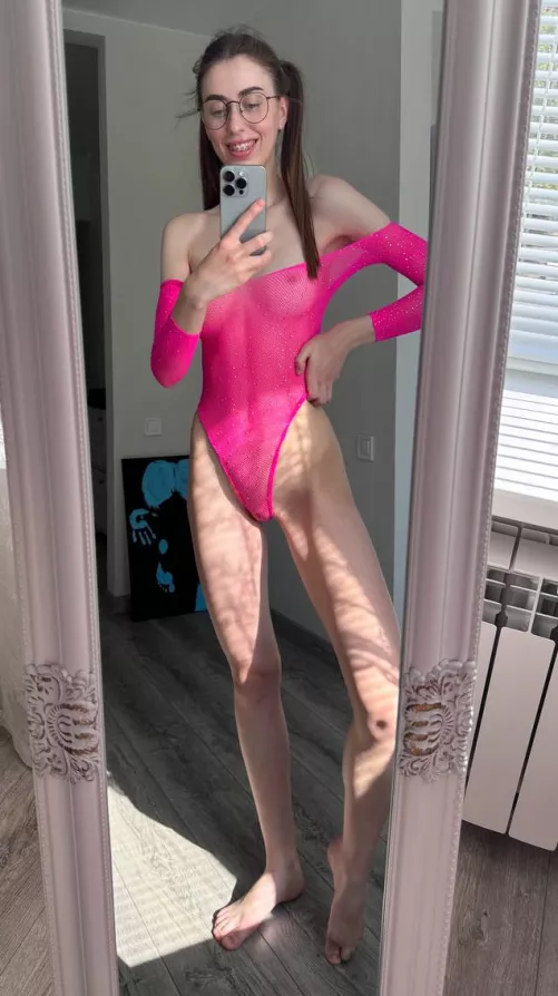 This shiny one-piece-suite accents my brilliant smile and long legs