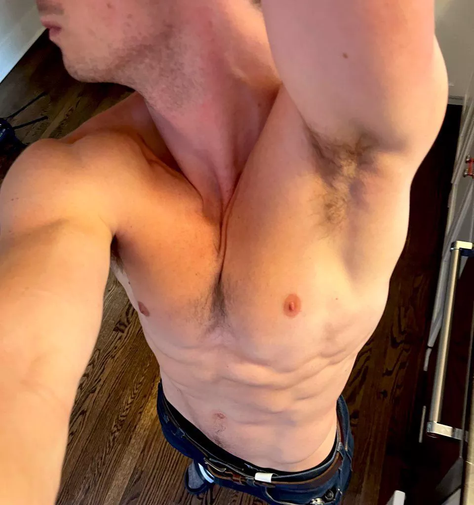 In the kitchen, making dinner. 