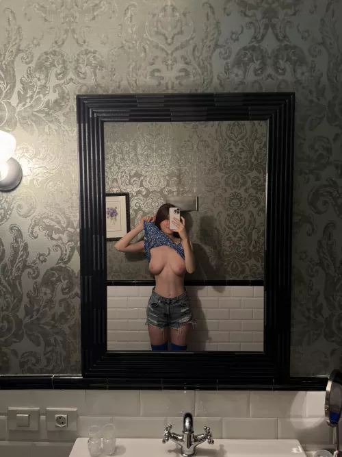 A perfect young body in the mirror