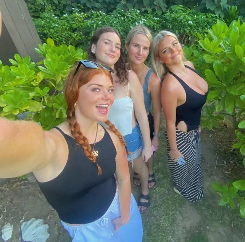 At the back of the pic, yet she's still the biggest part of it 👀