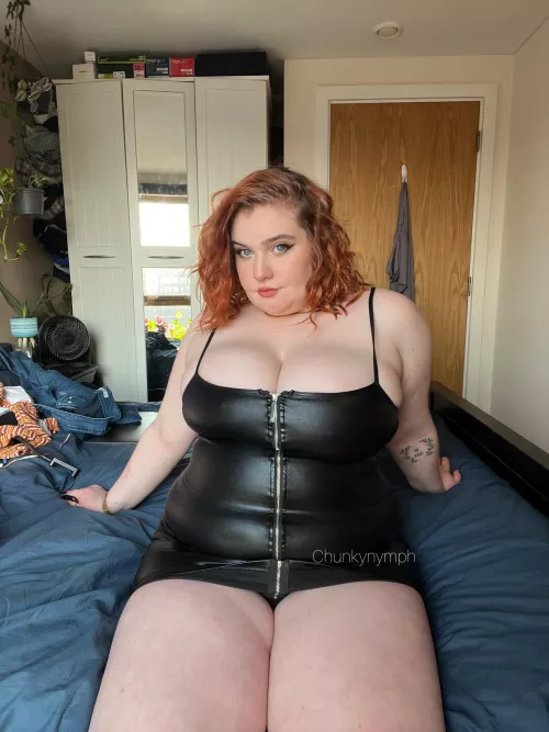 Nearly bursting out of this dress 