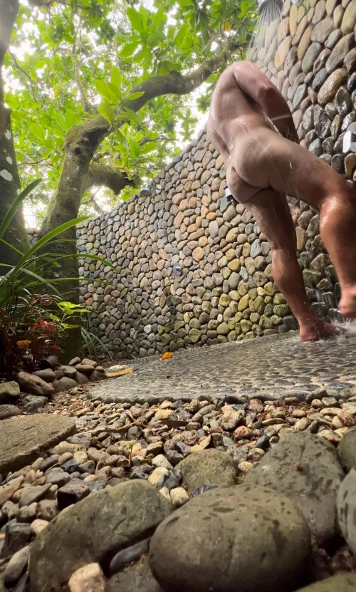 Soaking up in the outdoor shower 