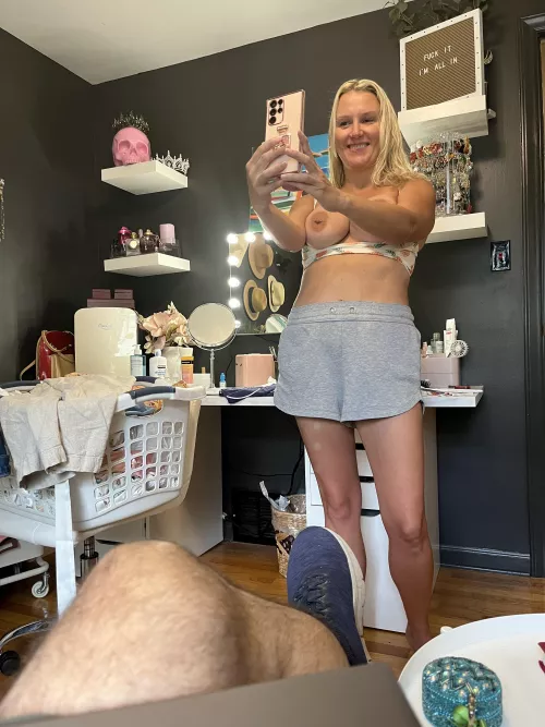 Taking a pic of my slutwife while she takes a selfie for some guy. 