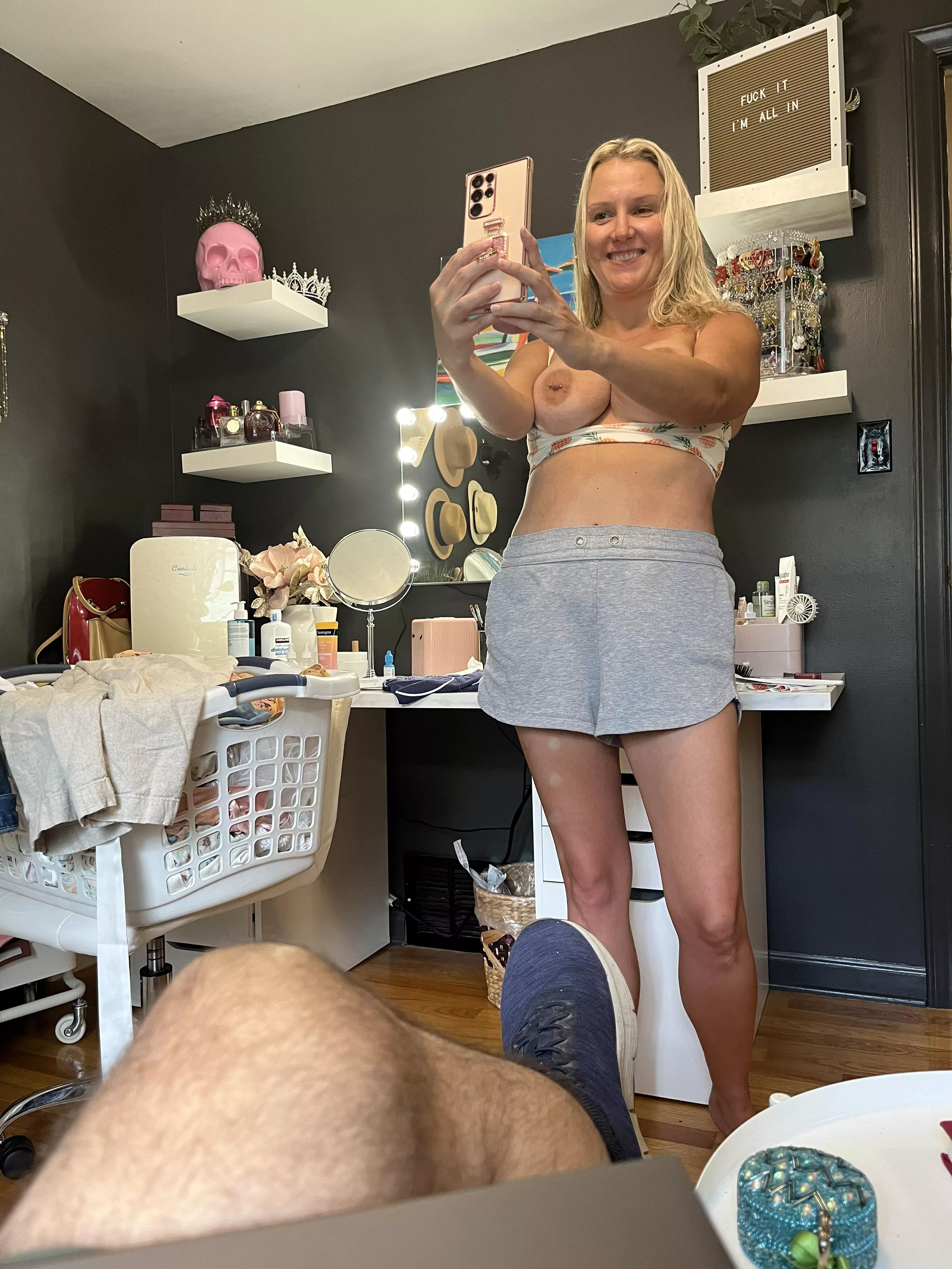 Taking a pic of my slutwife while she takes a selfie for some guy. 