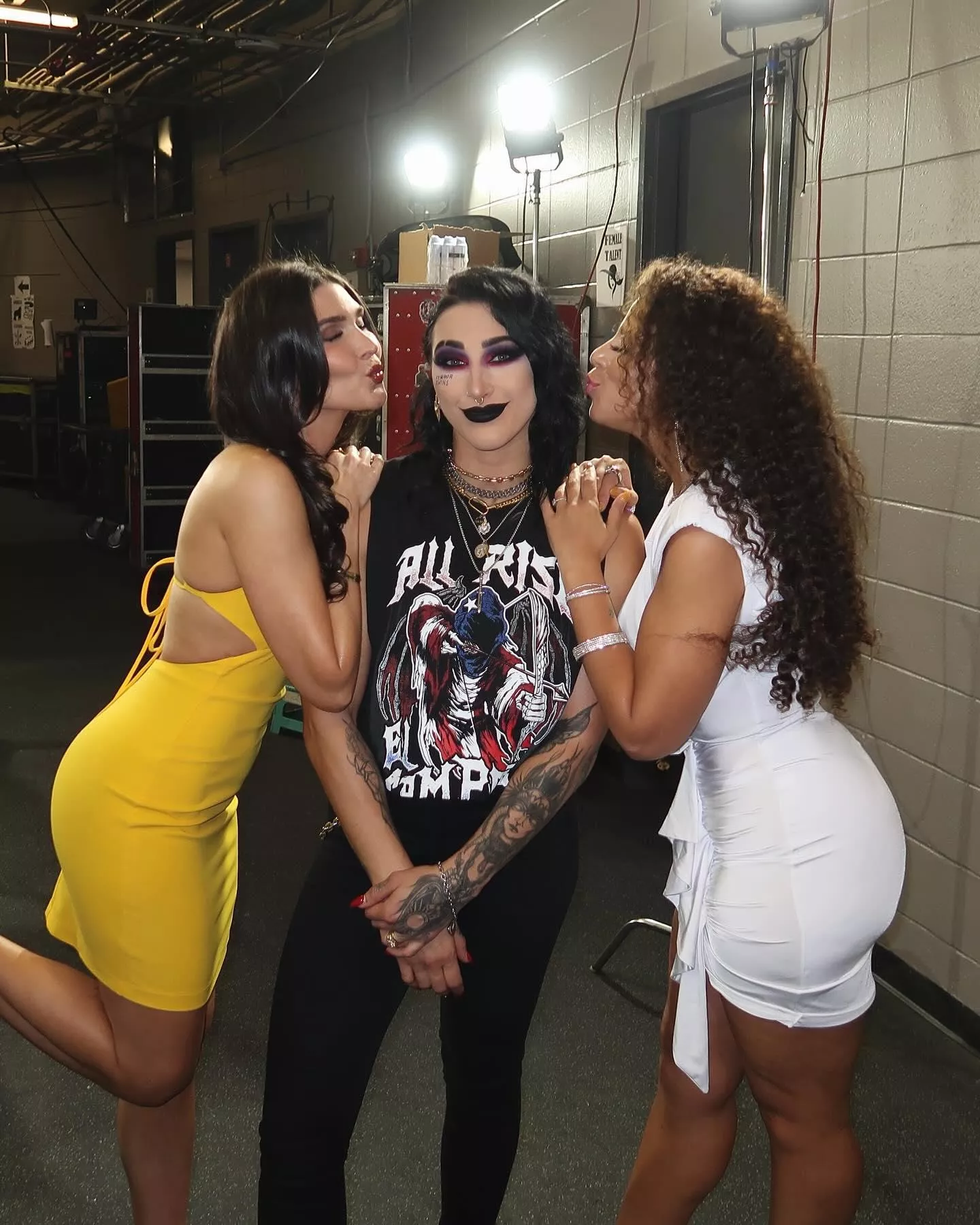 Cathy Kelley, Rhea Ripley and Samantha Irvin 