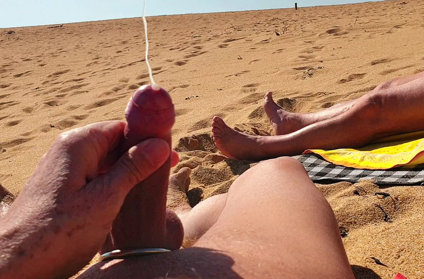 On the beach with people around