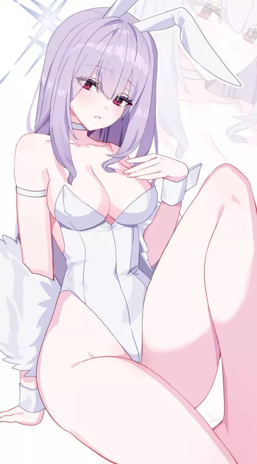 Showing off her white bunny suit 