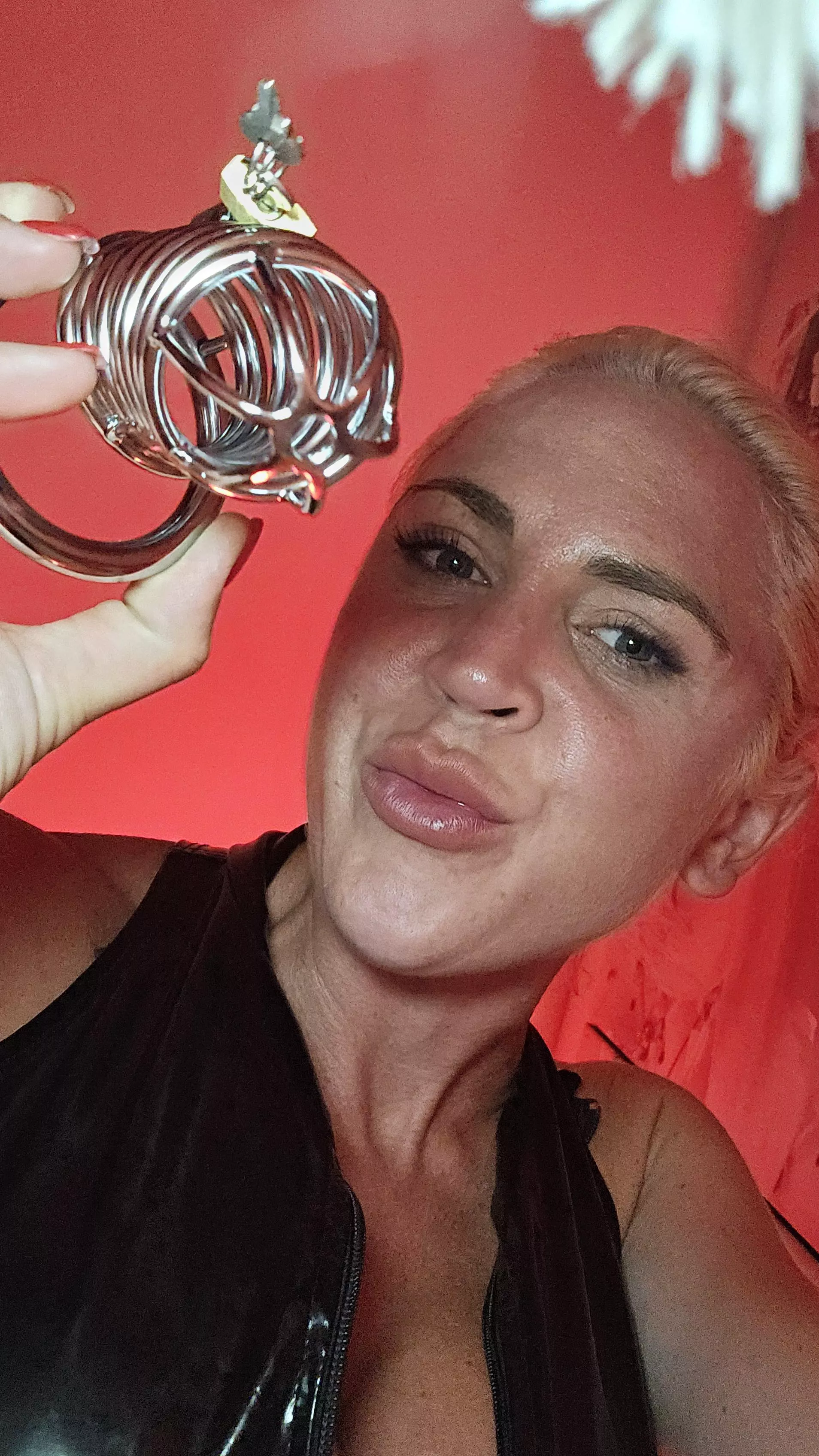 How would you like your manhood to be locked up and owned by this 60 y/o MILF?