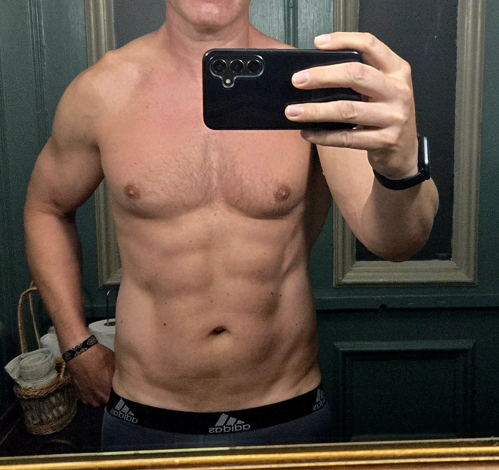 [48] your roommates Dad takes you both to the beach club for the day and looks like this and he keeps stealing glances at you...