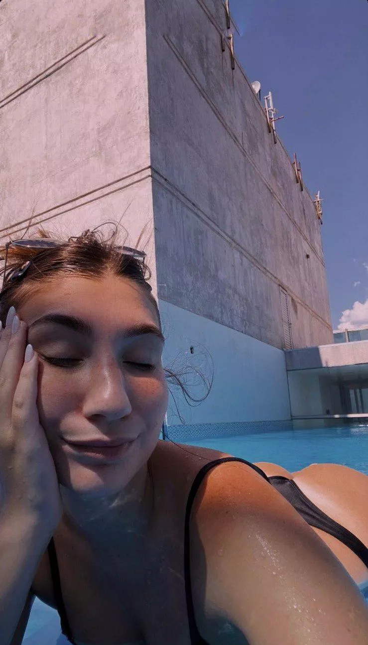 Stealing hearts, not towels, by the pool.