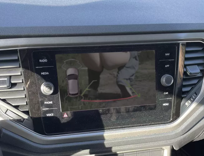 Just go behind the car, no one will see