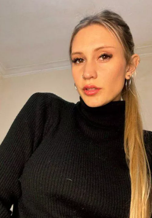 Having a black top can make you a classy woman.