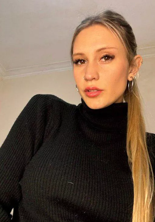 Having a black top can make you a classy woman.