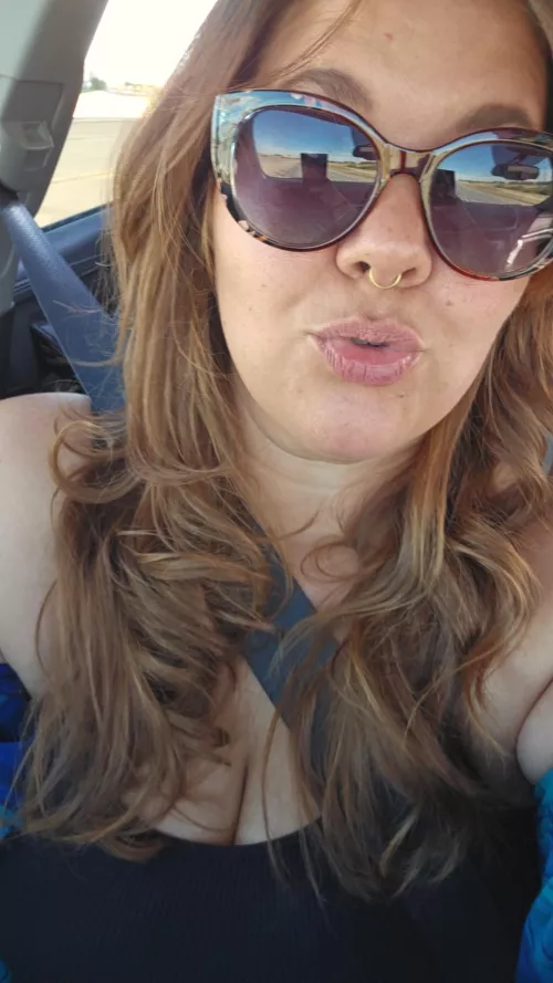 Every solo road trip calls for a selfie while singing