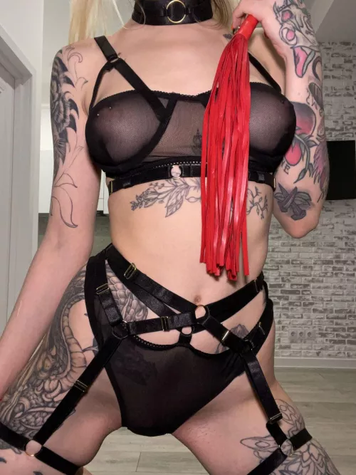 Inked Beauty in Red, Ready for Your Command