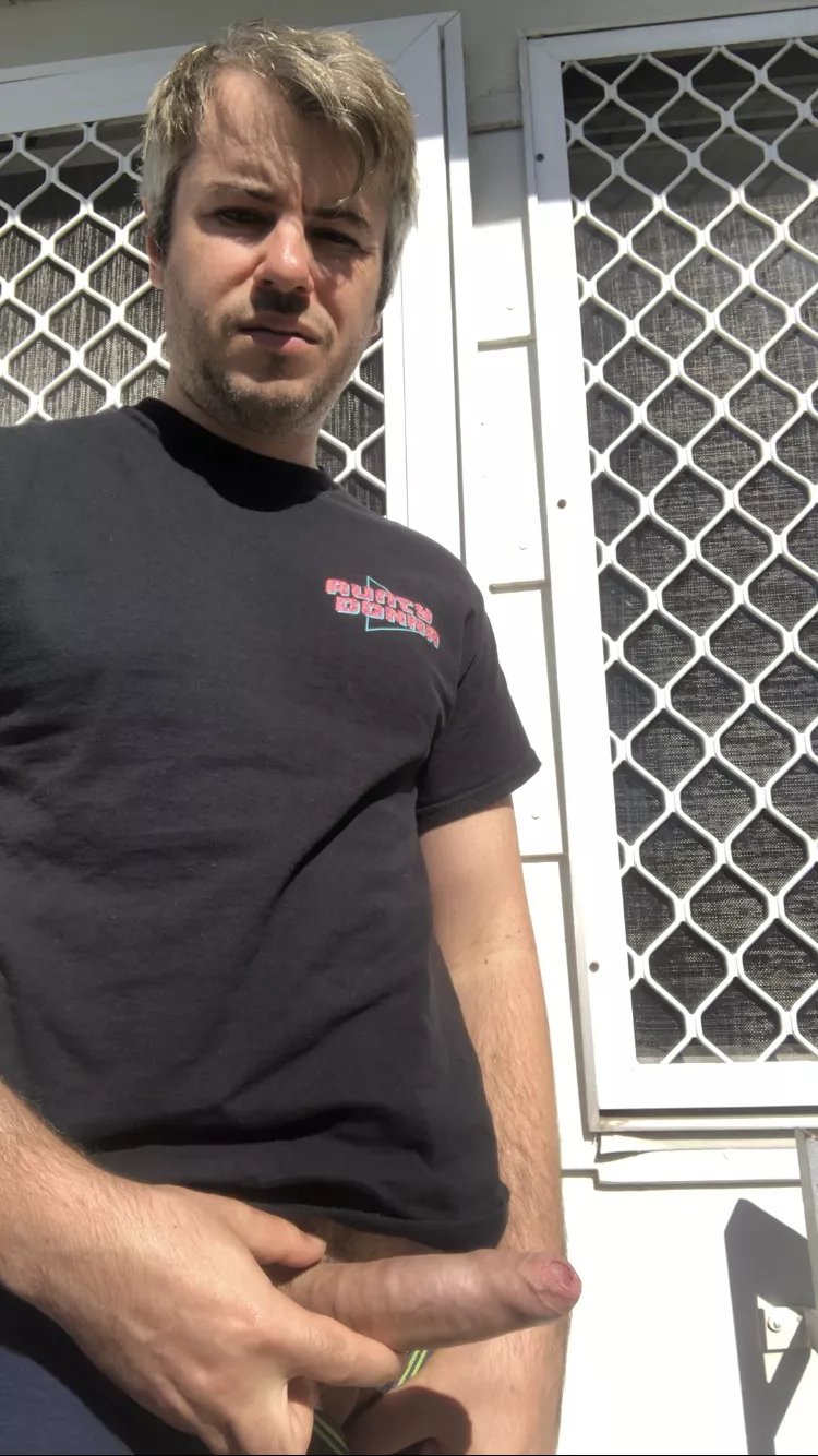 Standing on my front porch getting some sun