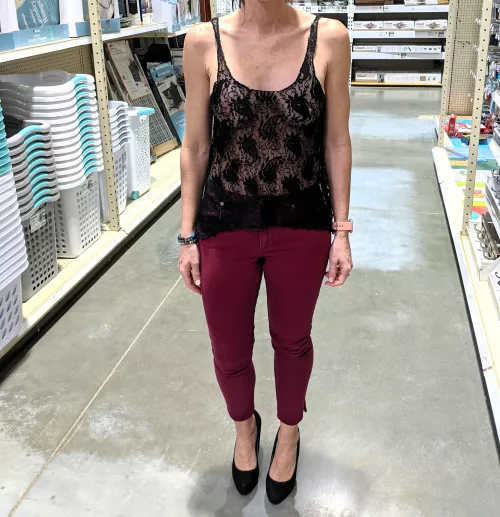 Shopping in a see through tank top