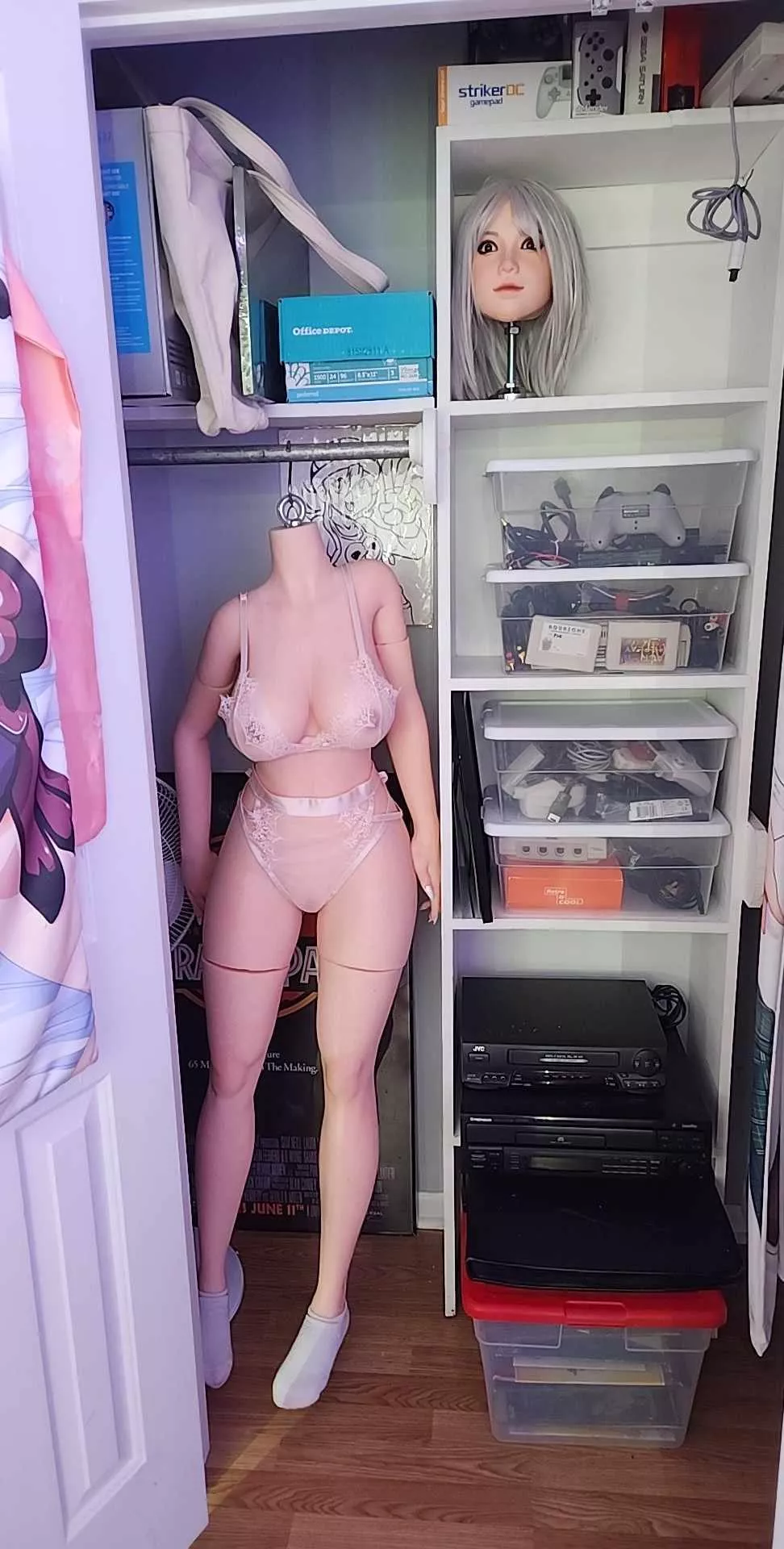 Doll shoulder stuck in shrug position. How to unshrug it?