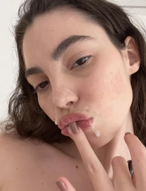 Playful brunette wants cum running down her face