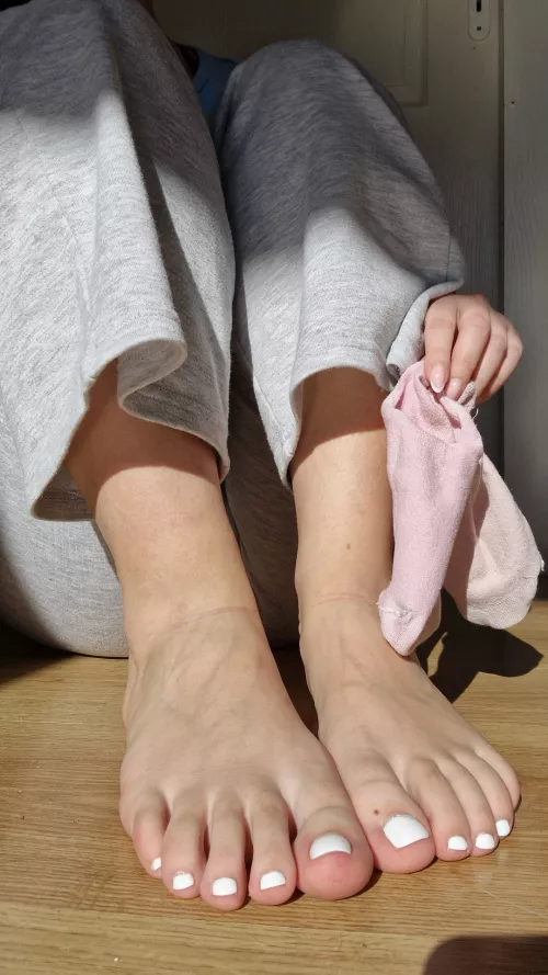 What caught your attention first? My white toes or my pink socks?