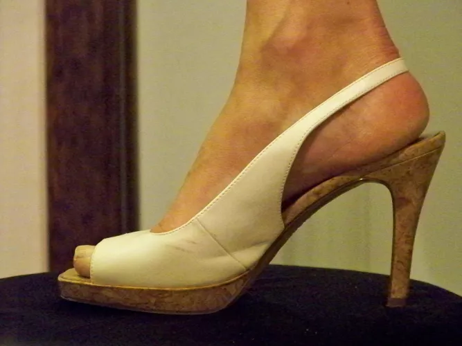 White strapped with cork sole and heel.