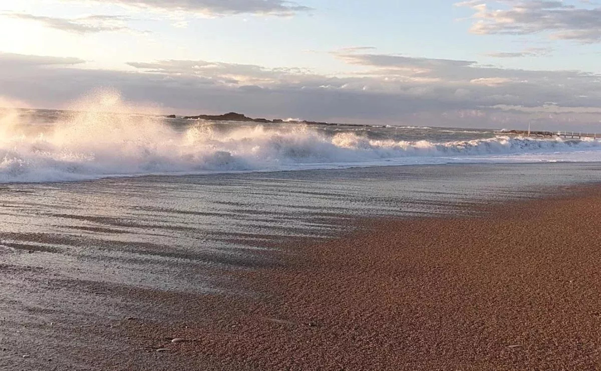 Sandy beach in Turkey and a small wave