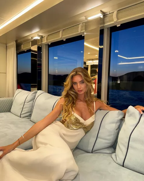 Beautiful girl on an expensive boat