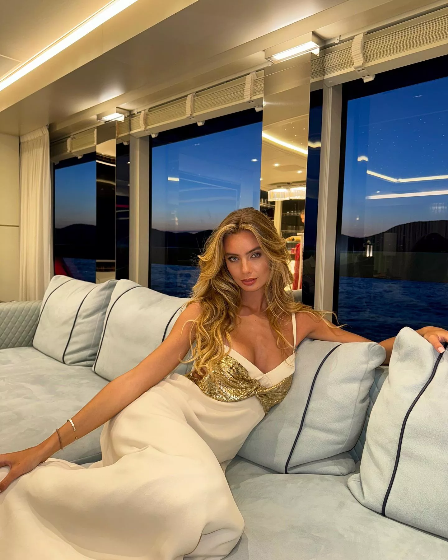 Beautiful girl on an expensive boat
